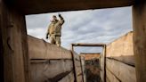 Ukraine builds barricades, digs trenches as focus shifts to defence