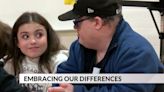 Fifth graders have pizza party with disabled adults