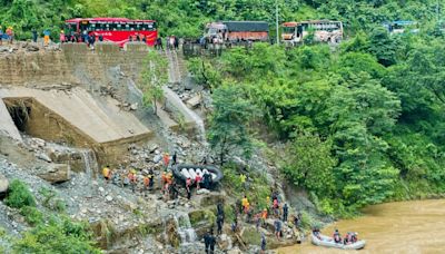 Nepal retrieves more bodies from buses swept away by landslide