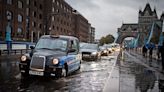 UK weather: Roads and railway tracks hit by flooding as month's worth of rain falls in days in some areas