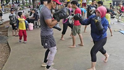 Indonesian women assert themselves with martial arts as gender-based violence remains a challenge