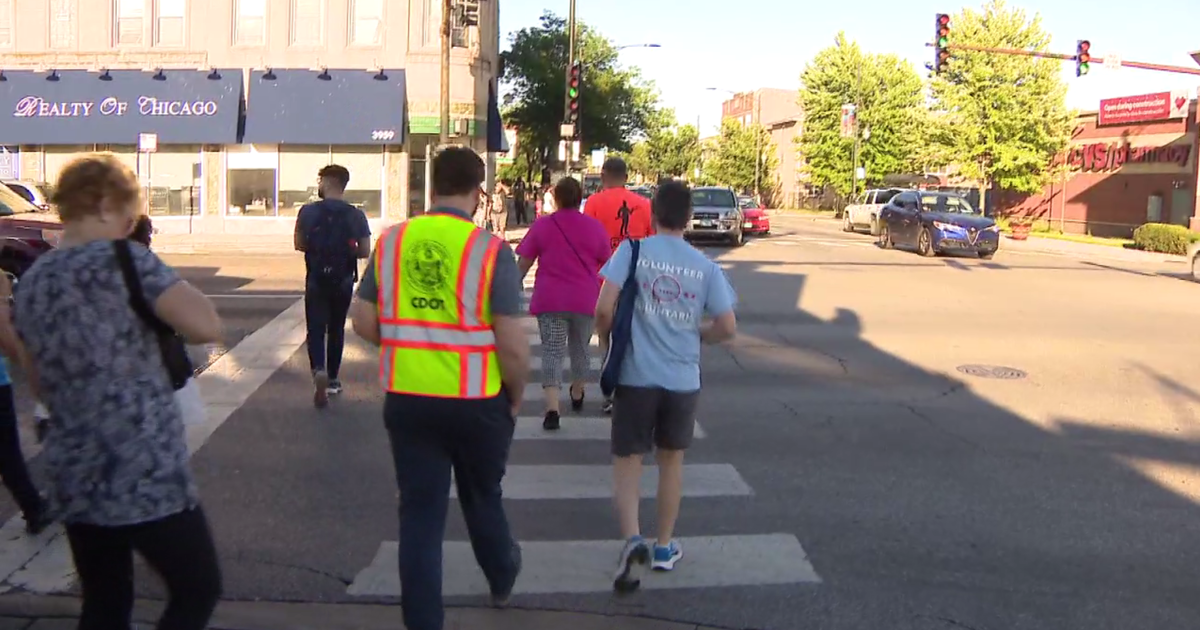 Group walks for safety on crash-plagued stretch of Pulaski Road on Chicago's Southwest Side