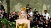 The Crown's Elizabeth Debicki Gleamed in Gold on the Met Gala Red Carpet