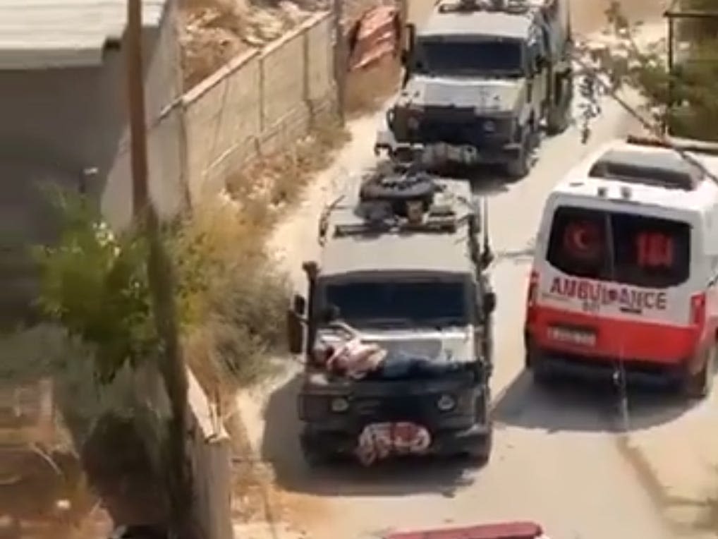 Video shows wounded Palestinian man strapped to Israeli military jeep as IDF says soldiers violated protocol