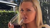 Sophie Monk shows off her ample cleavage as she spruiks budget wine