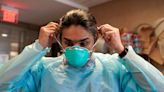 Mask mandates return at some US hospitals as COVID, flu jump