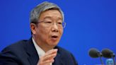 China chooses continuity, retaining central bank chief, finance minister