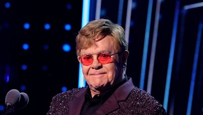 Elton John auctions off items from his wardrobe on eBay