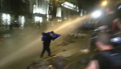 Georgia police unleash water cannons on protesters