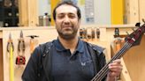 Iranian refugee in Scotland creates tartan guitar as thank you to locals