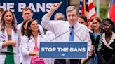 Gov. Cooper vetoes abortion bill in front of supporters and anti-abortion protesters