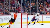 Oshie scores game-winner into empty net as Capitals make playoffs by beating Flyers