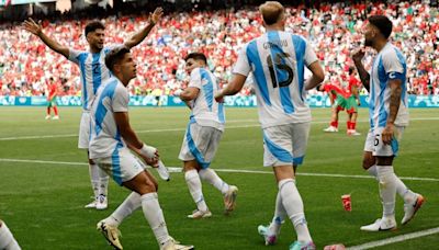 Argentina booed for racist remarks during a 2-2 draw against Morroco, Spain win Olympic men's football opener