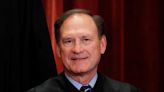 Upside-down flag at US Supreme Court Justice Alito’s home prompts recusal calls