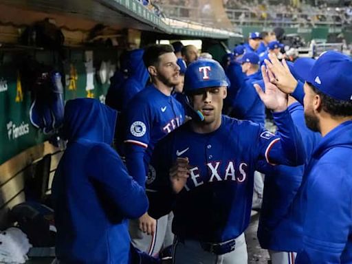 Evan Carter scratched from Texas Rangers’ lineup due to lower back stiffness