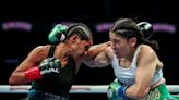 Mercado beats Britain's Ali to retain WBC title