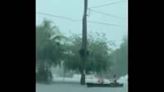 US: Two Men Paddle Boat Through Flooded Road In South Florida Amid Heavy Rains