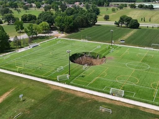 Sinkhole swallows soccer field in Illinois in shocking video