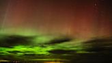 What causes the aurora borealis?