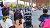 'We celebrate Juneteenth by supporting one another': Crowds cheer for downtown Indy parade