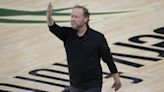 Mike Budenholzer is hired as coach of the Phoenix Suns, replacing Frank Vogel