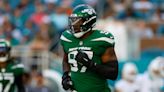 Jets re-sign Jalyn Holmes