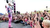 Machine Gun Kelly reacts to fan jumping on stage during Forbes event: See the video