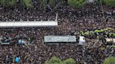 Iran's Raisi buried in Mashhad as mourners pack Iranian holy city
