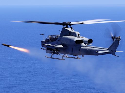 A US Marine Corps attack helicopter fired off a new 'fire and forget' missile for the first time in the Pacific, striking a moving vessel