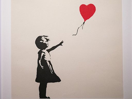 Two men charged with burglary after Banksy painting stolen