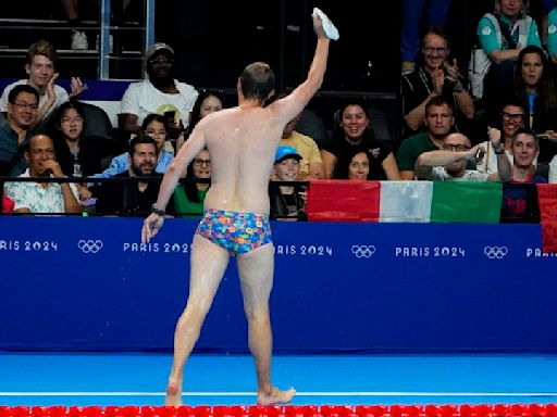 Olympic moment of the day: Cap-catching lifeguard steals the swimming show