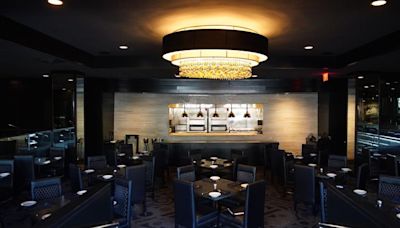 New Johnny D's opens in iconic Hyatt Regency restaurant space with a nod to past, future