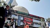 Sensex, Nifty settle marginally down in volatile trade on eventful Budget day