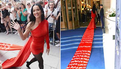 Katy Perry Takes on Paris in Red-Hot Minidress with Mega Train Featuring Lyrics from Her New Single