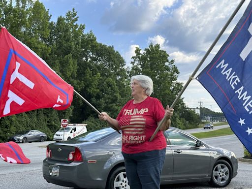 In one affluent Atlanta suburb, Biden and Trump work to win over wary Georgia voters
