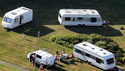 Estate residents call in police after travellers move onto green