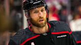 Canes retool defense, re-sign Slavin, add Walker