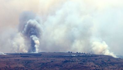 Hezbollah fires more than 200 missiles at Israeli targets following killing of commander