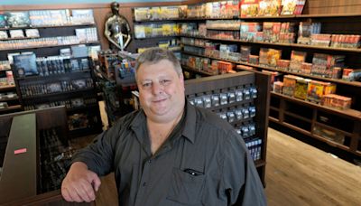 By day, he's a development firm executive. His side project is a new Milwaukee games shop