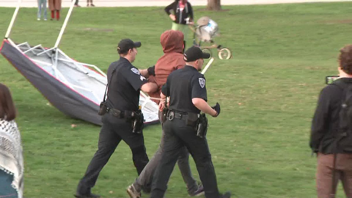 Police taking protestors into custody at University of New Hampshire