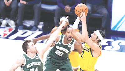 Indiana Pacers celebrate while sending Milwaukee Bucks packing to end their NBA playoff series Thursday