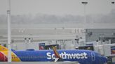 More than 2,300 flights are canceled and thousands more delayed as snow and icy weather moving through the US continue to interrupt air travel