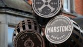 UK pub group Marston's returns to annual profit; flags cost pressures