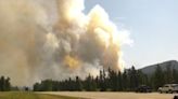 'Praying for the people': Tourists' plans derailed after flames tear through Jasper