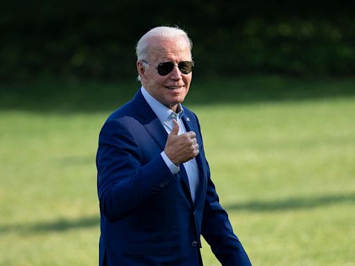 Biden returns to campaign trail as Trump forced to remain in court for second day of New York hush money trial