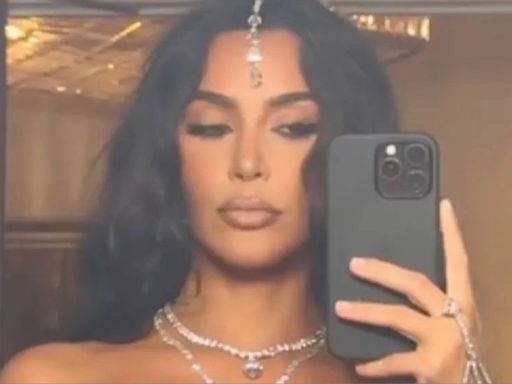 Kim Kardashian Broke Wedding Guest Etiquette With Her Red Tassel Bra