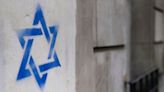 Stars of David spray-painted on Paris buildings 'recall events of 1930s' antisemitism, says mayor