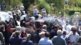 France cancels major Iran opposition rally as Tehran’s opponents face massive police raid in Albania