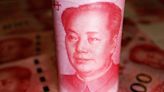 China yuan slides to four-month low, state banks step in