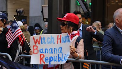A bare breast and ‘civil war’: MAGA diehards showed up at Trump Tower - and it got weird